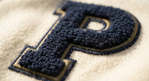 Tactile chenille stitching detail